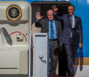 Gov. Bill Walker follows President Barack Obama off of Air Force One on the president's trip to Alaska in 2015.