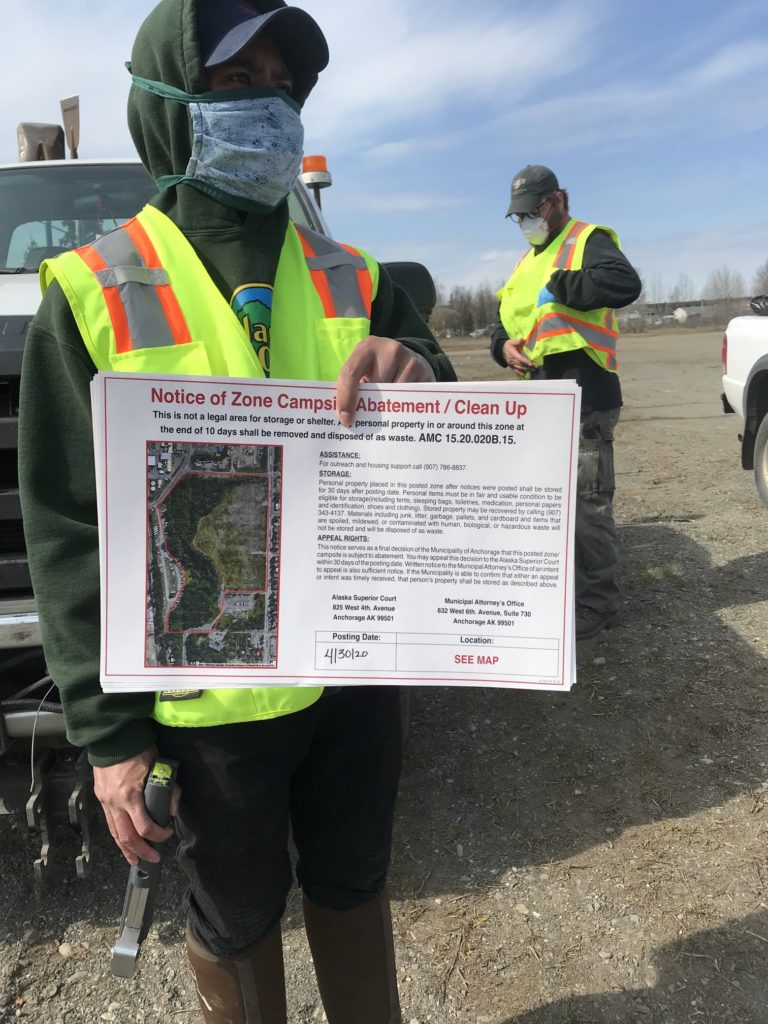 Ban Camp: Mayor shows up with cops, masks, signage