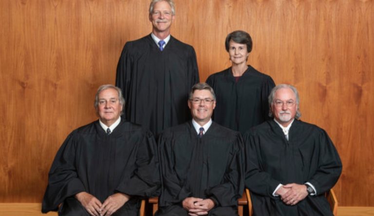 Supreme Court says no signature needed on absentee ballots