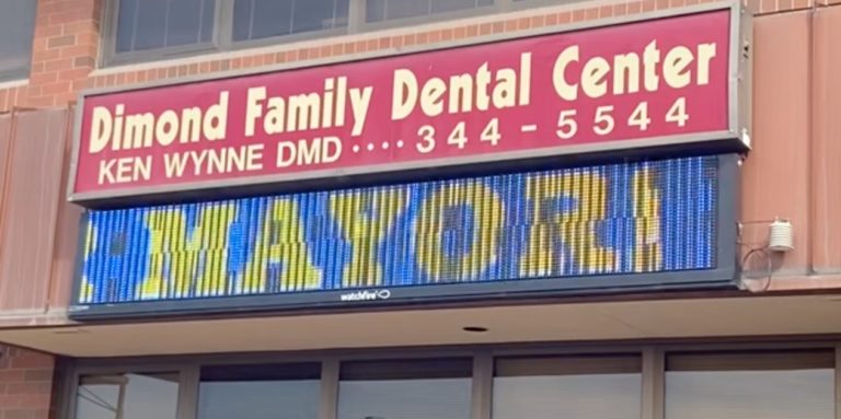Better? Dentist puts smiles on faces with his ‘No more losers’ LED sign aimed at Dunbar
