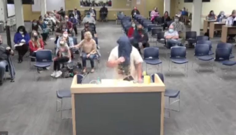 When is a mask not a mask? School board president mutes mic of man wearing shirt on head for ‘face mask’