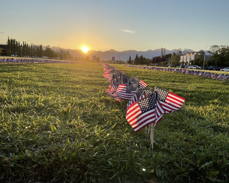 Honoring the day: Volunteers plant 3,000 flags at sunrise in Anchorage to commemorate victims of 9-11