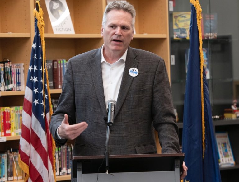 Bipartisan: Celebrating reading, Dunleavy and legislators tout Alaska Reads Act, and he autographs books for the kids at elementary school