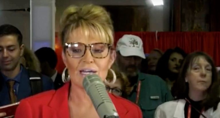 Fact check: Palin tells Steve Bannon and CPAC that Alaska has gone to mail-in-only elections and that the third-place voter getter could win for Congress