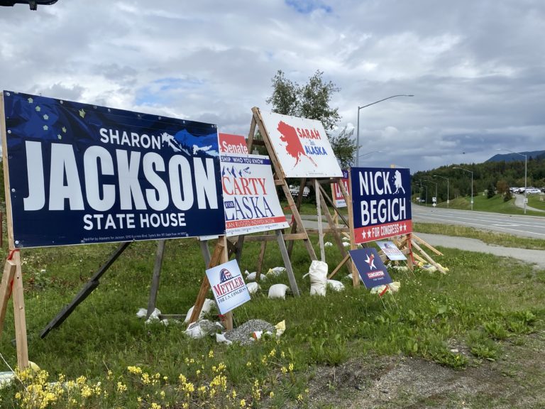 Sign of corruption? Campaign signs in Eagle River get the red-flag treatment … but two candidates get a pass