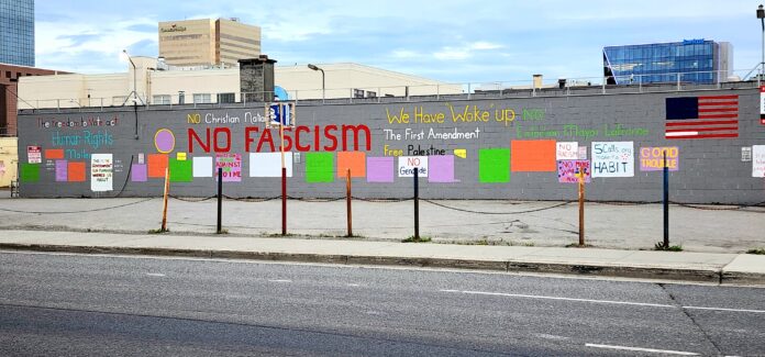 Parking lot political messaging at 4th and C in Anchorage